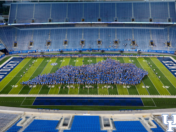 UK Students form a shape of Kentucky on Kroger Field during a K-Week Event.